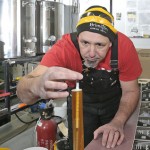 Brewmaster Rod Daigle works in the Brimstone Brewing Company's brewery in the basement of the Sanctuary Centre for the Arts in Ridgeway.